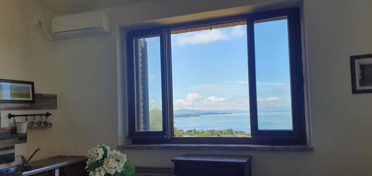 Poloturisticoumbria Rustico Con Piscina Vista Lago Пассиньяно-суль-Тразимено Экстерьер фото